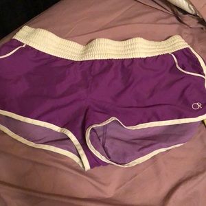 purple swim shorts